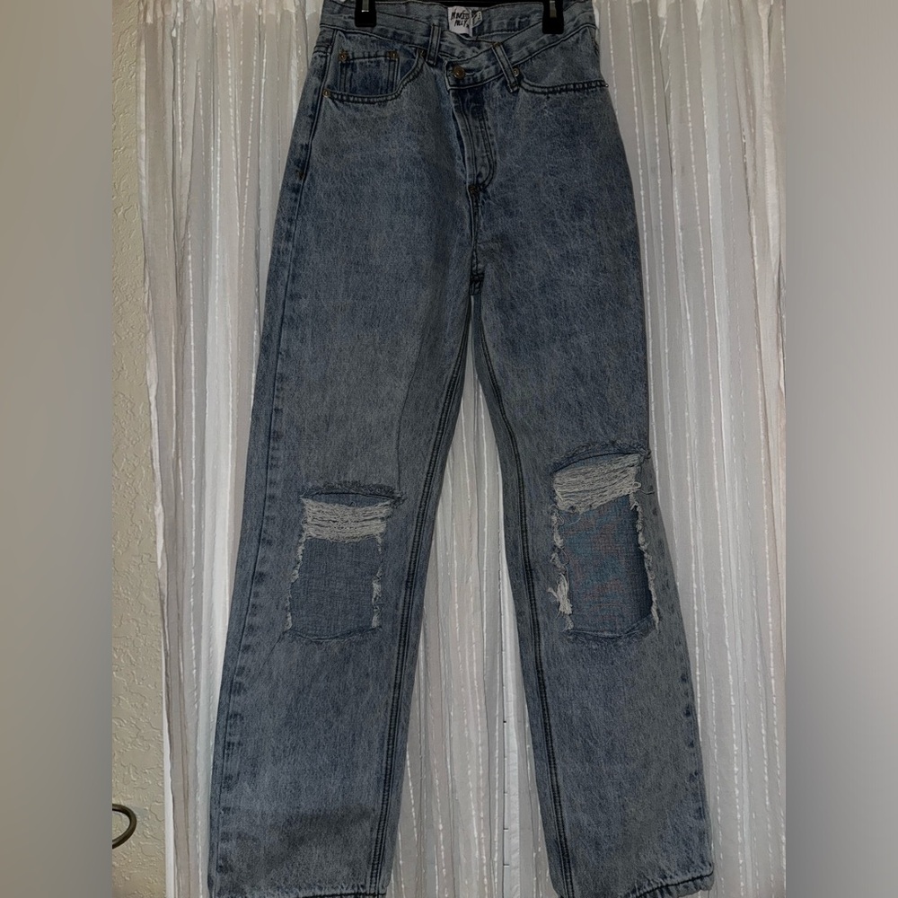 Criss Cross Asymmetrical distressed, wide leg denim jeans